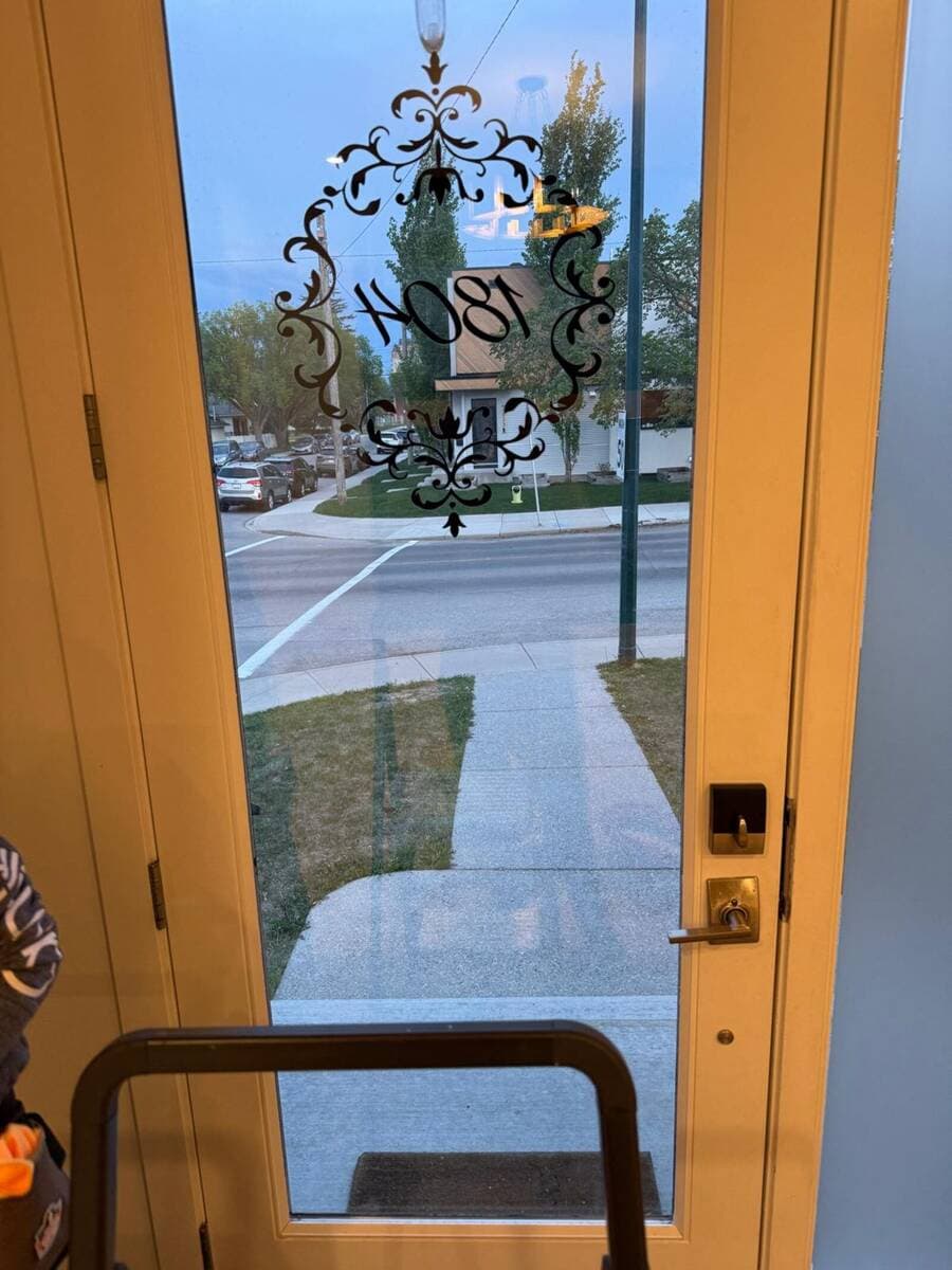 Frosted Entry-Door Privacy Film — Capitol Hill, Calgary before film