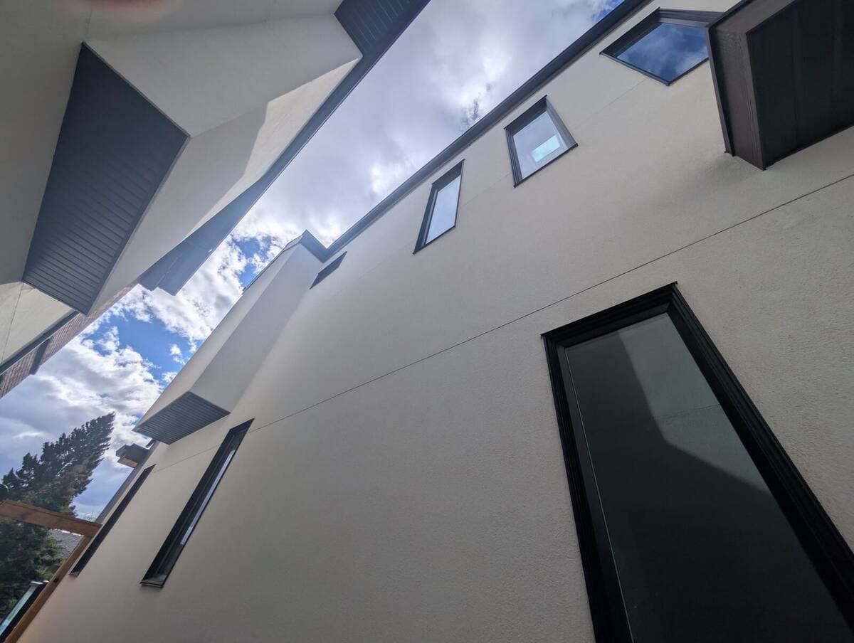 Solar Film on High Windows, Scaffold Access — Rosscarrock, Calgary before film